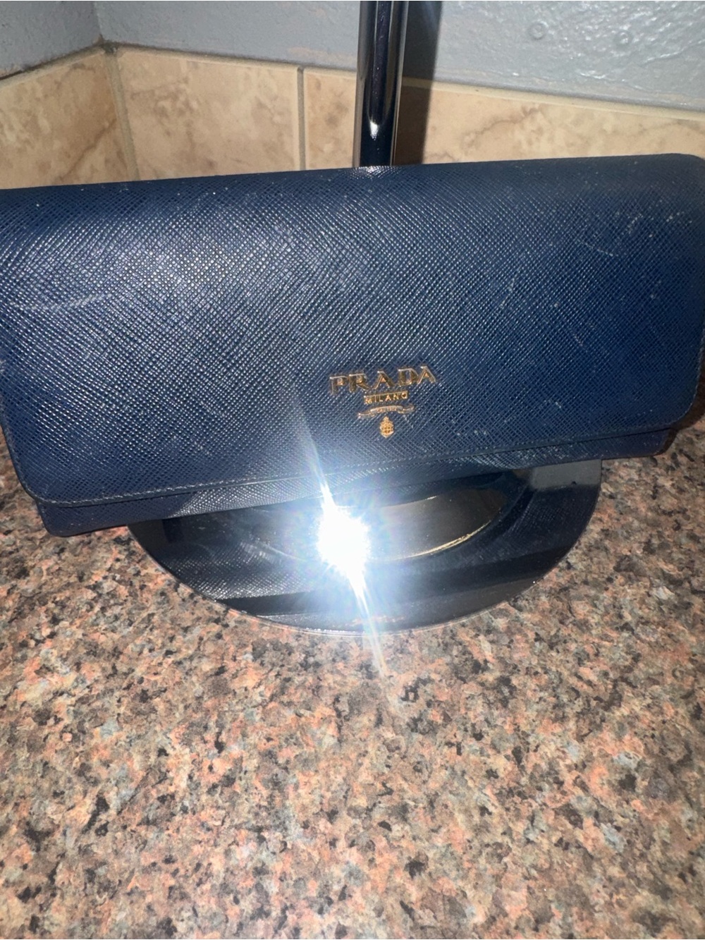 Prada Navy Saffiano Leather Wallet.
